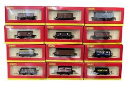 A large collection of boxed Hornby 00 gauge wagons.