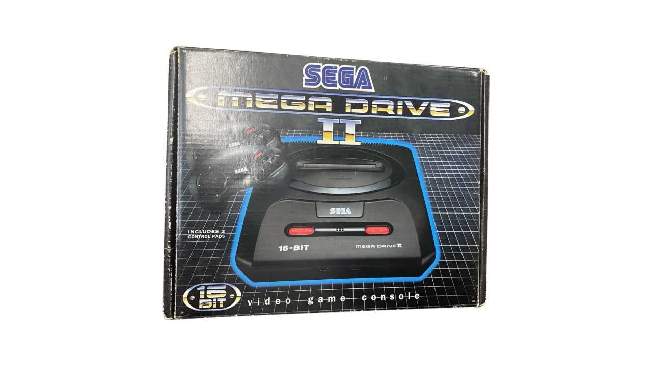 A boxed Sega Mega Drive II console, game pads and connection cables - Lion King edition, to also - Image 2 of 2