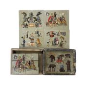 An early 20th century set of boxed picture-puzzle blocks, with original reference pictures (AF)