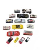 A mixed lot of various large unboxed die-cast sports cars and boxed model cars.