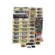 A collection of various boxed die-cast vehicles, to include Matchbox Models of Yesteryear, Lledo