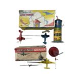 A pair of vintage tin-plate aeroplane toys with original boxes, to include: - The Airliner Super