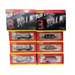A pair of boxed Hornby 00 gauge triple wagon packs, to include: - R6306 3 Assorted Plank Wagons (