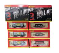 A pair of boxed Hornby 00 gauge triple wagon packs, to include: - R6306 3 Assorted Plank Wagons (