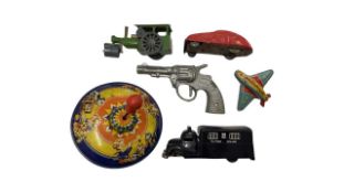 A collection of tin-plate vehicles and other toys, to include: - Fairylite cast metal cap gun -