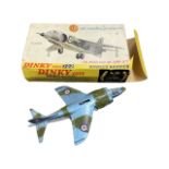 A boxed Dinky Toys Hawker Harrier 722. Lacking nose cone and one wing stabiliser.