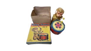 A boxed 1950s Japanese Monkey the Drummer clockwork Monkey, by Fuji Kogyoshoco Ltd