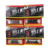 A collection of boxed Hornby 00 gauge triple-pack wagons, to include: - R6150 - 3x MGR Hopper Wagons