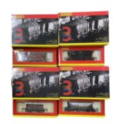 A collection of boxed Hornby 00 gauge triple-pack wagons, to include: - R6150 - 3x MGR Hopper Wagons