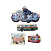 A collection of Japanese tin plate toys, to include: - ST M1567512 Police Motorcycle - Animal
