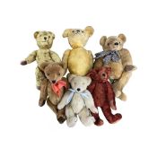 A collection of vintage and modern Teddy Bears