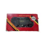 A boxed Hornby 00 gauge R098 LMS Brake Van in black