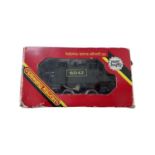 A boxed Hornby 00 gauge R098 LMS Brake Van in black