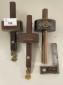 Three vintage hardwood wood working marking gauges together with a adjustable set square (4)