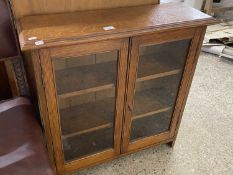 Small oak two door bookcase or display cabinet