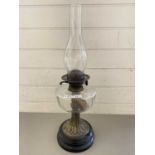 Oil lamp with clear glass font