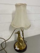 Brass based table lamp formed as a Greyhound