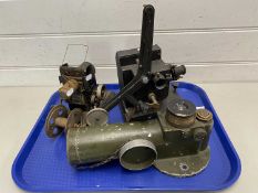 Mixed Lot: A Bingoscope projector, a further vintage projector and a vintage military telescope