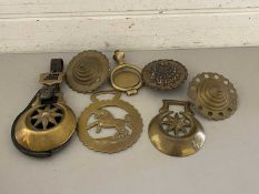 Box of various horse brasses