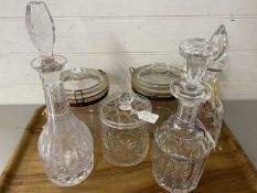 Mixed Lot: Various decanters and glass biscuit barrels