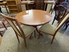 Modern pedestal dining table and four chairs