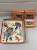 Box of small Victory vintage wooden jigsaws and others
