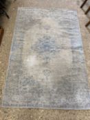 20th Century blue floral decorated rug - worn condition