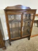 Early 20th Century bow front two door china display cabinet