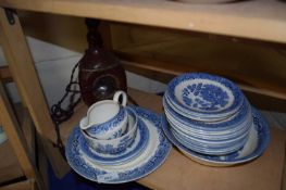 Quantity of assorted Willow pattern tea and dinner wares and a novelty decanter lamp