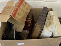 Box of various house clearance sundries, vintage photograph album containing a few black and white