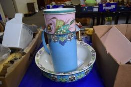 Polychrome wash bowl with associated jug and a ceramic planter