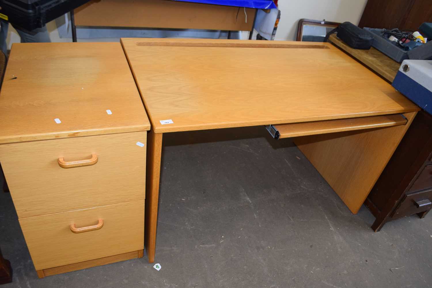 Light wood office desk and accompanying filing cabinet (2)