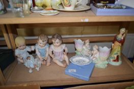Four pottery models of dolls together with a Wedgwood pin dish, a pair of spill vases and a Janice