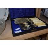 A cased set of bone handled fish knives and forks