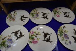 Six hand painted plates with scenes of birds and flowers