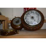 Three wall mounted barometers