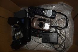 Pentax ESPIO 738S camera together with a Panasonic phone, charges etc