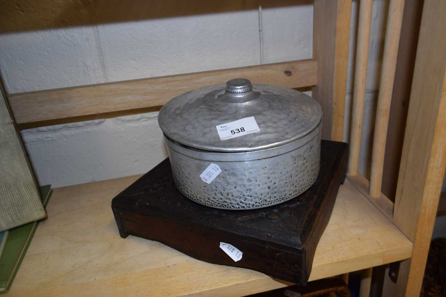 Wooden stand together with aluminium pot and cover