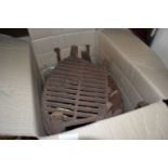 Two cast iron fire grates and other items