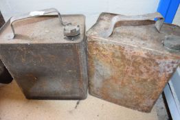 2 vintage oil cans with brass tops