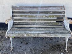 Cast iron ended wooden slatted garden bench, height approx 80cm, width approx 117cm