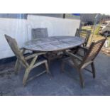 Teak garden dining table with four chairs