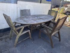 Teak garden dining table with four chairs