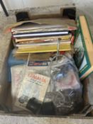 Box containing various manuals, magazines etc for various makes and models of motorcycles and cars