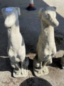 Two composite statues formed as seated whippets, height 75cm