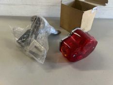 Rear light assembly together with number plate mount for a Yamaha motorcycle