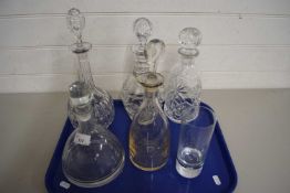 Five various assorted decanters