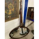 Mixed Lot: An oval wall mirror and vintage fishing rods