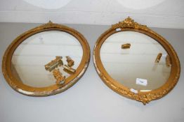 Two oval gilt framed mirrors (a/f)