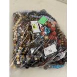 A quantity of mixed hardstone and other bead jewellery to include tigers eye, garnets, amber,